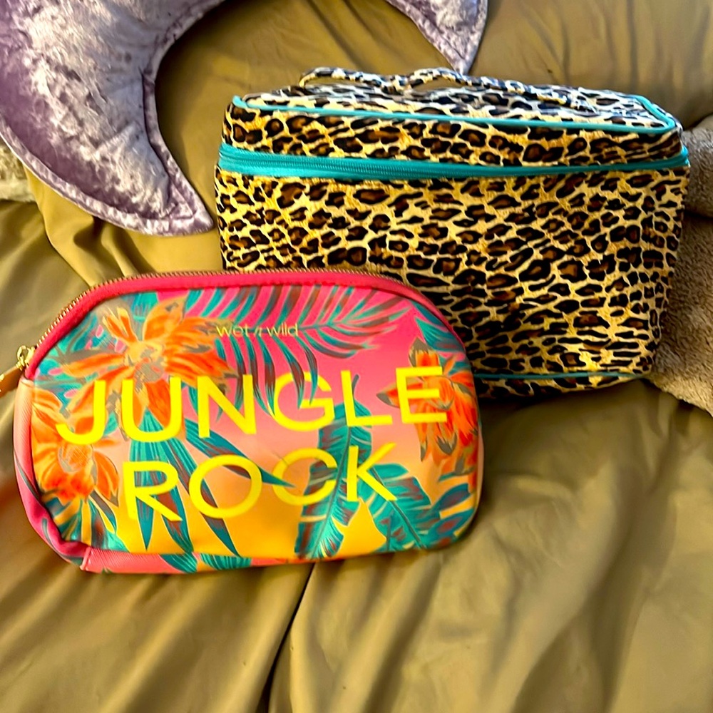Set of 2 gently used makeup bags. One is unbranded and the other is wet n wild
